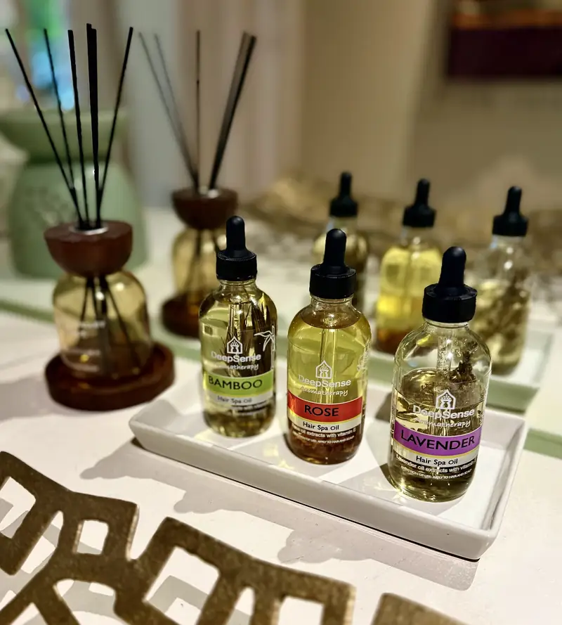 DeepSense massage oils in dropper bottles with reed diffusers
